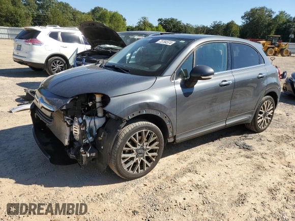 2018 FIAT 500X Lounge with VIN ZFBCFXDB5JP664130, listed as a Copart auction lot 73784574 with 67,160 mi miles and Salvage title. Bid and sale history available at DreamBid. Image 1.