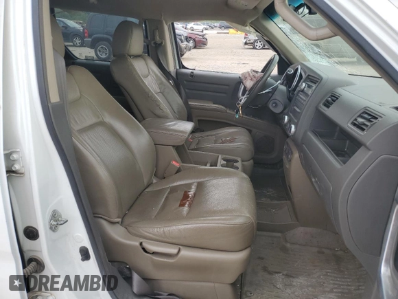 2008 Honda Ridgeline RTL with VIN 2HJYK16548H521019, listed as a Copart auction lot 60598235 with 248,372 mi miles and Salvage title. Bid and sale history available at DreamBid. Image 7.