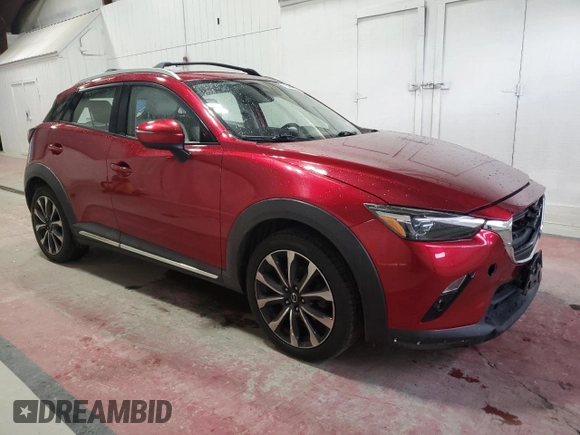 2019 Mazda CX-3 Grand Touring with VIN JM1DKFD77K0423490, listed as a Copart auction lot 76463324 with 88,031 mi miles and Salvage Title. Bid and sale history available at DreamBid. Image 4.