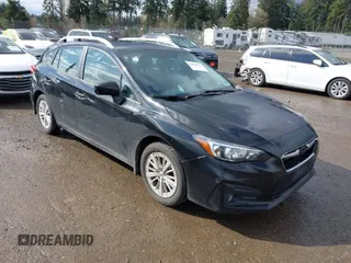 2018 Subaru Impreza Premium with VIN 4S3GTAB61J3749533, listed as a IAAI auction lot 41946375 with 60,261 mi miles. Bid and sale history available at carsss.com. Image 1.