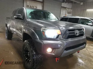 2014 Toyota Tacoma with VIN 5TFLU4ENXEX089927, listed as a Copart auction lot 52140565 with 112,924 mi miles and Salvage Title. Bid and sale history available at DreamBid. Image 4.