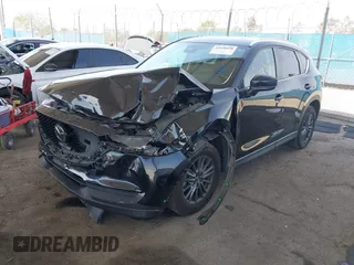 2020 Mazda CX-5 Touring with VIN JM3KFACM0L0804998, listed as a IAAI auction lot 41850998 with 44,519 mi miles. Bid and sale history available at carsss.com. Image 17.