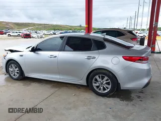 2018 Kia Optima LX z VIN 5XXGT4L3XJG231457, wystawiony jako IAAI lot #42255585 z przebiegiem 75 877 mil mil oraz . Historia ofert i sprzedaży dostępna na DreamBid. Obrazek 14.