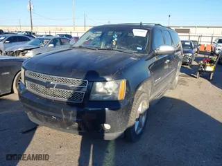 2011 Chevrolet Suburban LTZ with VIN 1GNSCKE00BR353106, listed as a IAAI auction lot 41393001 with 252,968 mi miles. Bid and sale history available at carsss.com. Image 17.