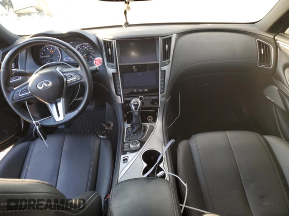 2019 Infiniti Q60 Luxe with VIN JN1EV7EL2KM290162, listed as a Copart auction lot 87421264 with 64,537 mi miles and Salvage title. Bid and sale history available at DreamBid. Image 8.