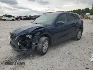 2016 Mazda CX-5 Touring с VIN JM3KE4CY9G0886484, выставлен на аукционе Copart как лот 61504795 с пробегом 166 422 миль миль и Чистый • Clean title. История ставок и продаж доступна на DreamBid. Изображение 1.