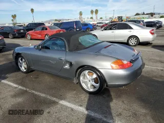 2002 Porsche Boxster z VIN WP0CA29862U621821, wystawiony jako Copart lot #85770484 z przebiegiem 121 843 mil mil oraz Czysty tytuł • Clean title. Historia ofert i sprzedaży dostępna na DreamBid. Obrazek 2.