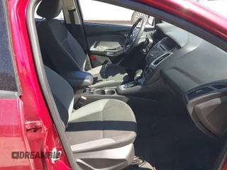 2014 Ford Focus SE with VIN 1FADP3F21EL209637, listed as a IAAI auction lot 42063454 with 148,359 mi miles. Bid and sale history available at carsss.com. Image 5.