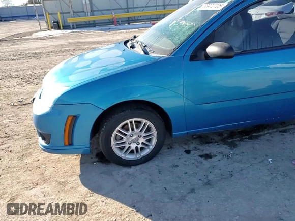2007 Ford Focus S z VIN 1FAFP31N77W244856, wystawiony jako Copart lot #88972705 z przebiegiem Nie podano mil oraz Szkoda całkowita • Salvage title. Historia ofert i sprzedaży dostępna na DreamBid. Obrazek 11.