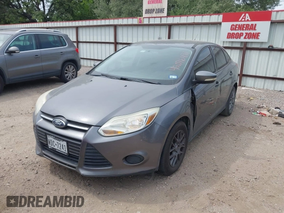 2013 Ford Focus SE z VIN 1FADP3F23DL159239, wystawiony jako IAAI lot #42076471 z przebiegiem 111 346 mil mil oraz . Historia ofert i sprzedaży dostępna na DreamBid. Obrazek 2.