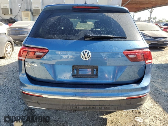 2020 Volkswagen Tiguan SE z VIN 3VV3B7AXXLM150387, wystawiony jako Copart lot #50516415 z przebiegiem 31 419 mil mil oraz Szkody całkowita. Historia ofert i sprzedaży dostępna na DreamBid. Obrazek 6.