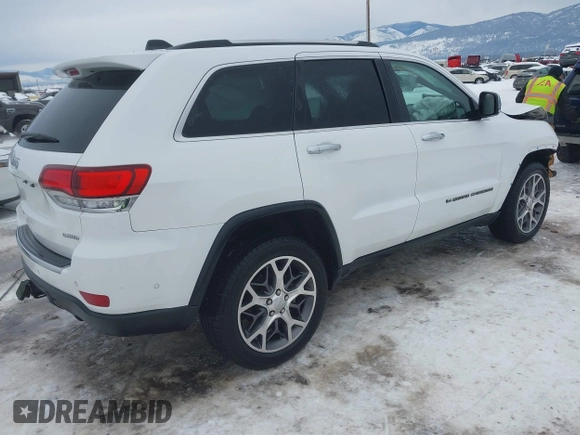 2022 Jeep Grand Cherokee Limited with VIN 1C4RJFBG5NC123297, listed as a IAAI auction lot 41509434 with 58,944 mi miles and . Bid and sale history available at DreamBid. Image 4.
