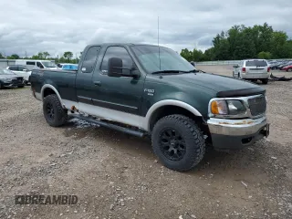 2001 Ford F-150 XL z VIN 1FTRX18L41NB56019, wystawiony jako Copart lot #62537655 z przebiegiem Nie podano mil oraz Szkoda całkowita • Salvage title. Historia ofert i sprzedaży dostępna na DreamBid. Obrazek 4.