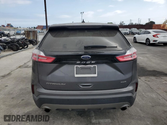 2021 Ford Edge Titanium with VIN 2FMPK4K96MBA16599, listed as a Copart auction lot 53920735 with 71,376 mi miles and Salvage title. Bid and sale history available at DreamBid. Image 6.