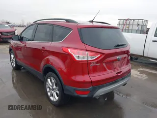 2015 Ford Escape SE with VIN 1FMCU0GXXFUC74470, listed as a IAAI auction lot 41419669 with 94,107 mi miles. Bid and sale history available at carsss.com. Image 3.