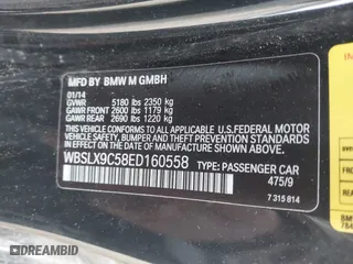 2014 BMW M6 with VIN WBSLX9C58ED160558, listed as a IAAI auction lot 41553209 with 154,789 mi miles. Bid and sale history available at carsss.com. Image 9.