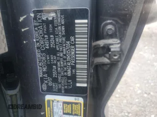 2017 Kia Optima LX z VIN KNAGT4L31H5157034, wystawiony jako Copart lot #45582345 z przebiegiem 239 655 mil mil oraz Szkoda całkowita • Salvage title. Historia ofert i sprzedaży dostępna na DreamBid. Obrazek 14.