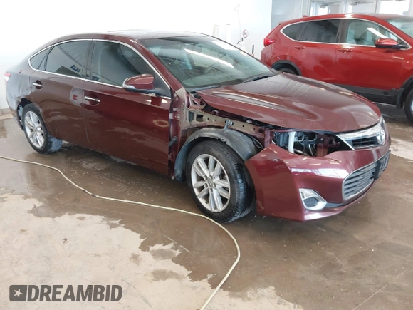 2015 Toyota Avalon Limited with VIN 4T1BK1EB8FU187603, listed as a IAAI auction lot 41633899 with 94,825 mi miles and . Bid and sale history available at DreamBid. Image 1.