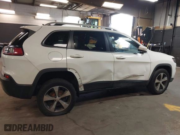2019 Jeep Cherokee Limited z VIN 1C4PJMDXXKD294822, wystawiony jako IAAI lot #41995583 z przebiegiem 135 688 mil mil oraz . Historia ofert i sprzedaży dostępna na DreamBid. Obrazek 6.