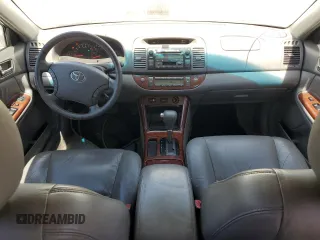 2006 Toyota Camry LE z VIN 4T1BF30K46U116549, wystawiony jako Copart lot #55606105 z przebiegiem 232 128 mil mil oraz Szkoda całkowita • Salvage title. Historia ofert i sprzedaży dostępna na DreamBid. Obrazek 8.