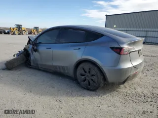 2025 Tesla Model Y Long Range with VIN 7SAYGDEE7SA345606, listed as a Copart auction lot 88669765 with 0 mi miles and Salvage Title. Bid and sale history available at carsss.com. Image 2.