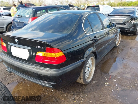 2003 BMW 3 Series 330i with VIN WBAEV53453KM03111, listed as a IAAI auction lot 42007086 with 156,353 mi miles. Bid and sale history available at carsss.com. Image 4.