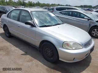 2000 Honda Civic VP with VIN 2HGEJ661XYH590562, listed as a IAAI auction lot 42088612 with 236,202 mi miles. Bid and sale history available at carsss.com. Image 1.