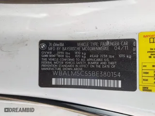 2011 BMW Z4 sDrive30i with VIN WBALM5C55BE380154, listed as a IAAI auction lot 41815724 with 118,062 mi miles. Bid and sale history available at carsss.com. Image 9.