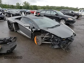 2014 Lamborghini Aventador z VIN ZHWUR1ZD6ELA03035, wystawiony jako Copart lot #66784084 z przebiegiem 23 771 mil mil oraz Szkody całkowita. Historia ofert i sprzedaży dostępna na DreamBid. Obrazek 4.