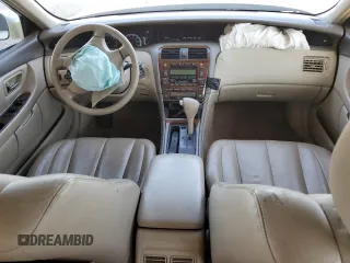 2000 Toyota Avalon XL with VIN 4T1BF28B6YU093177, listed as a Copart auction lot 51853895 with 189,631 mi miles and Salvage Title. Bid and sale history available at DreamBid. Image 8.
