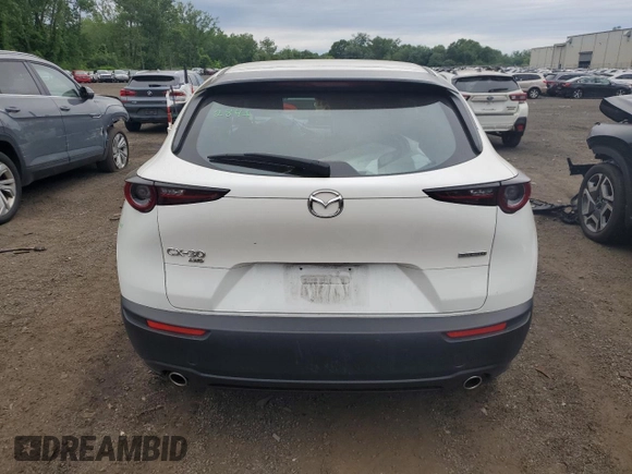 2024 Mazda CX-30 S with VIN 3MVDMBAM8RM639660, listed as a Copart auction lot 62124575 with 24,227 mi miles and Salvage title. Bid and sale history available at DreamBid. Image 6.