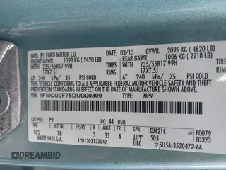 2013 Ford Escape S with VIN 1FMCU0F75DUD00309, listed as a IAAI auction lot 42017289 with 184,026 mi miles. Bid and sale history available at carsss.com. Image 9.