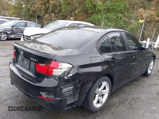 2015 BMW 3 Series 328i xDrive with VIN WBA3B5C55FP654730, listed as a IAAI auction lot 41578639 with 173,935 mi miles and . Bid and sale history available at DreamBid. Image 4.