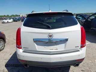 2016 Cadillac SRX Luxury Collection z VIN 3GYFNBE3XGS505311, wystawiony jako IAAI lot #42066399 z przebiegiem 87 132 mil mil oraz . Historia ofert i sprzedaży dostępna na DreamBid. Obrazek 17.