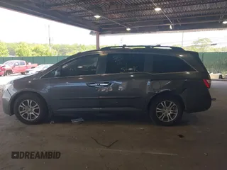 2012 Honda Odyssey EX-L with VIN 5FNRL5H67CB016934, listed as a IAAI auction lot 42405714 with 248,512 mi miles and . Bid and sale history available at DreamBid. Image 14.