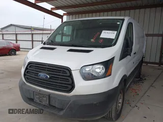 2019 Ford Transit with VIN 1FTYE1ZM2KKB46391, listed as a IAAI auction lot 41362328 with 128,327 mi miles and . Bid and sale history available at carsss.com. Image 22.