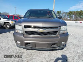 2011 Chevrolet Suburban LT with VIN 1GNSCJE00BR122636, listed as a IAAI auction lot 41594772 with 202,433 mi miles. Bid and sale history available at carsss.com. Image 11.