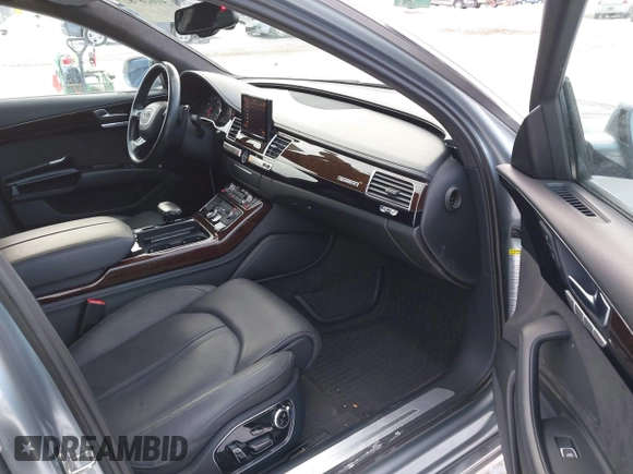 2012 Audi A8 with VIN WAURVAFD8CN017206, listed as a IAAI auction lot 41626707 with 138,922 mi miles and . Bid and sale history available at DreamBid. Image 5.
