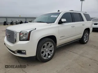 2015 GMC Yukon Denali with VIN 1GKS1CKJ5FR293612, listed as a Copart auction lot 47625975 with 98,533 mi miles and Salvage Title. Bid and sale history available at carsss.com. Image 1.