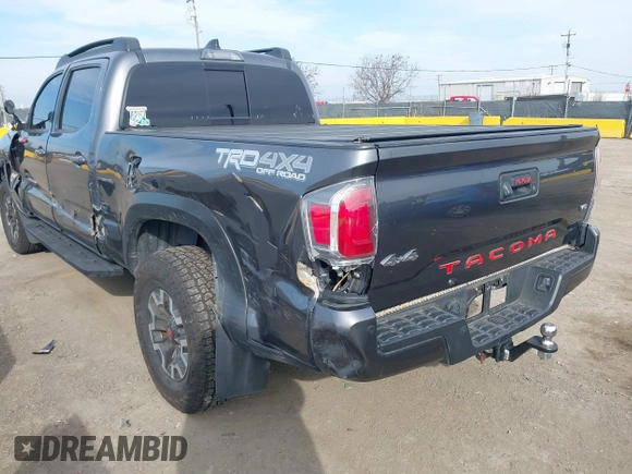 2021 Toyota Tacoma 4WD SR5 with VIN 3TMDZ5BN5MM110218, listed as a IAAI auction lot 41430303 with 47,781 mi miles. Bid and sale history available at carsss.com. Image 3.