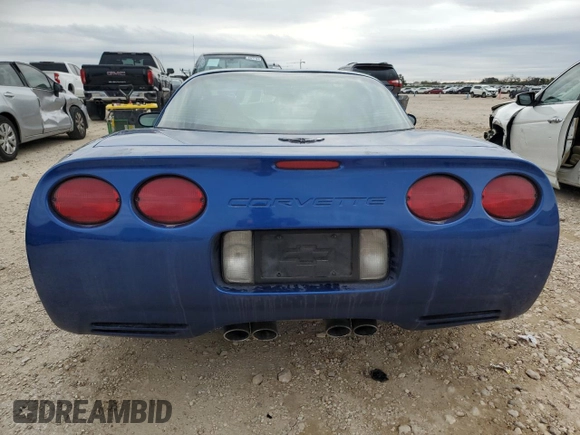 2002 Chevrolet Corvette with VIN 1G1YY22G825117812, listed as a Copart auction lot 82476834 with 86,521 mi miles and Salvage Title. Bid and sale history available at carsss.com. Image 6.