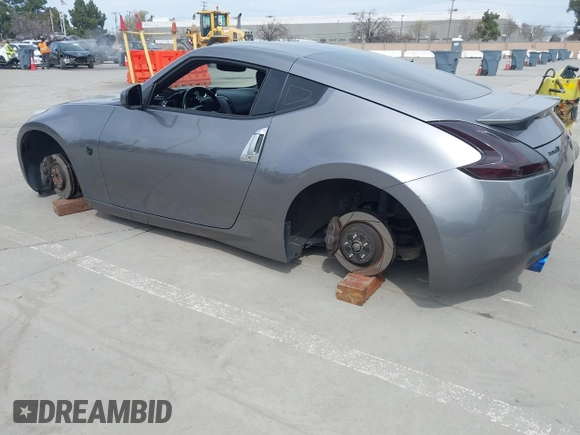 2012 Nissan 370Z Touring with VIN JN1AZ4EH4CM561415, listed as a IAAI auction lot 41838948 with 111,298 mi miles. Bid and sale history available at carsss.com. Image 3.