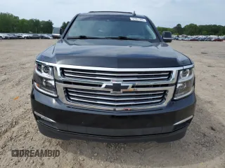 2015 Chevrolet Suburban LTZ with VIN 1GNSKKKC1FR624679, listed as a Copart auction lot 52957365 with 71,194 mi miles and Salvage Title. Bid and sale history available at DreamBid. Image 5.