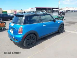 2010 MINI Hardtop S with VIN WMWMF7C51ATW89883, listed as a IAAI auction lot 42281047 with 121,847 mi miles and . Bid and sale history available at DreamBid. Image 4.