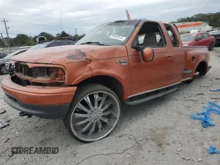 1999 Ford F-150 XL z VIN 1FTRX08L7XKB50493, wystawiony jako Copart lot #79948554 z przebiegiem Nie podano mil oraz Nie do naprawy • Non repairable. Historia ofert i sprzedaży dostępna na DreamBid. Obrazek 1.