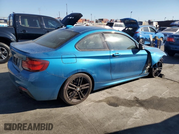 2021 BMW 2 Series M240i with VIN WBA2J5C04M7G65009, listed as a Copart auction lot 81797974 with 40,948 mi miles and Salvage Title. Bid and sale history available at carsss.com. Image 3.
