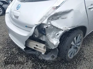2013 Nissan LEAF SL z VIN 1N4AZ0CP5DC403887, wystawiony jako IAAI lot #42141239 z przebiegiem 55 420 mil mil oraz . Historia ofert i sprzedaży dostępna na DreamBid. Obrazek 6.