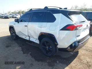 2021 Toyota RAV4 Hybrid XSE with VIN 4T3E6RFV3MU042773, listed as a IAAI auction lot 42000073 with 55,110 mi miles and . Bid and sale history available at DreamBid. Image 3.