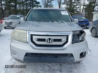 2011 Honda Pilot EX-L with VIN 5FNYF3H6XBB041672, listed as a IAAI auction lot 41337038 with 205,741 mi miles and . Bid and sale history available at DreamBid. Image 13.