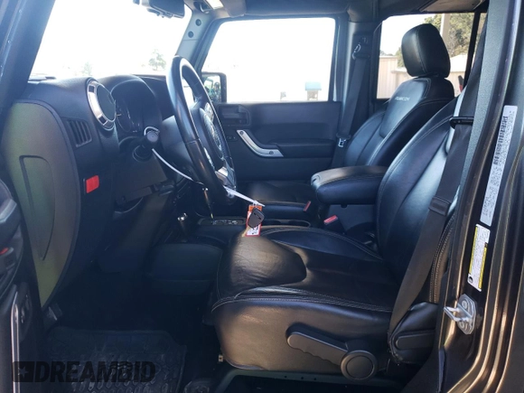 2016 Jeep Wrangler Unlimited Rubicon Hard Rock with VIN 1C4HJWFG7GL239318, listed as a Copart auction lot 76356734 with 121,442 mi miles and Salvage Title. Bid and sale history available at carsss.com. Image 7.